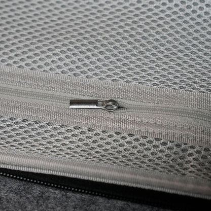 Close-up of a Akko Keyboard Carrying Case on a textured gray fabric surface